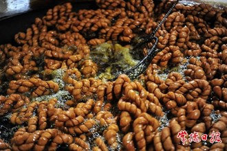 【摄影报道】澳门金沙博彩娱乐平台级非物质文化遗产——望羊麻花出锅了！